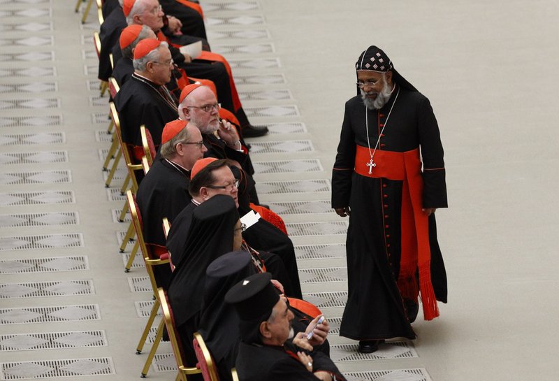 Cardinal Baselios Cleemis Thottunkal walks to his seat during an event marking the 50th anniversary of the Synod of Bishops in Paul VI hall at the Vatican in 2015.(CNS/Paul Haring)