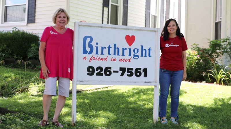 Sheila Calhoun, right, director of Birthright of Owensboro, Ky., and Laura Payne, a volunteer, stand outside the western Kentucky pregnancy resource center Aug. 11, 2022. (OSV News photo/Elizabeth Wong Barnstead, Western Kentucky Catholic)