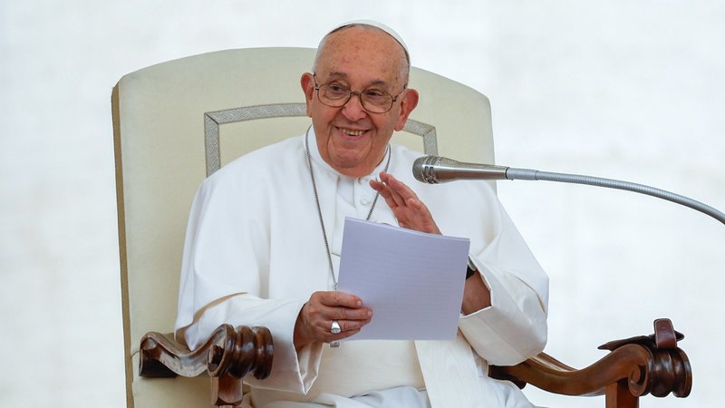 Pope Francis speaks to visitors in St. Peter's Square during his weekly general audience at the Vatican June 19, 2024. (CNS photo/Lola Gomez)