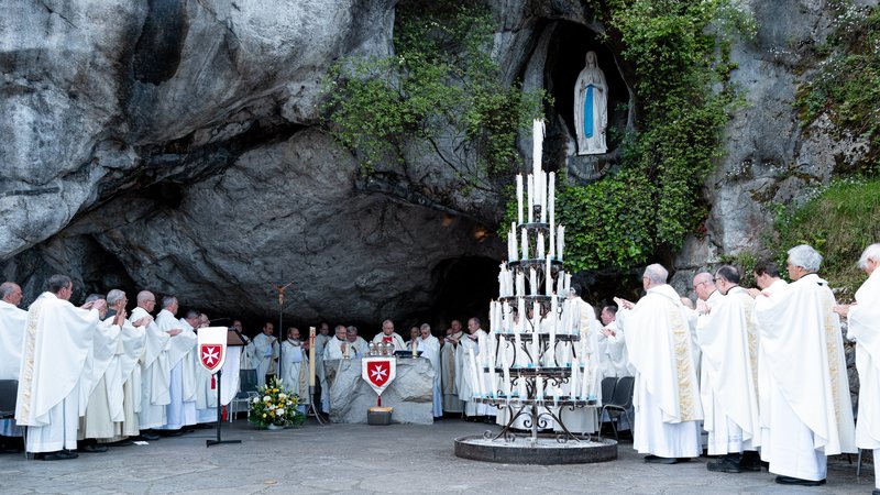Archbishop José H. Gomez presides over a May 4 Mass with other bishops and priests at the Grotto of Massabielle in Lourdes. (Order of Malta Western (USA) Association, Inc.)