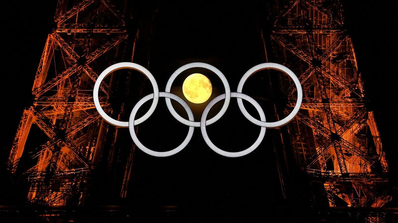 The moon is pictured with the Olympic rings on the Eiffel Tower ahead the Paris 2024 Olympic and Paralympic Games in Paris July 23, 2024. (OSV News photo/Kai Pfaffenbach, Reuters)