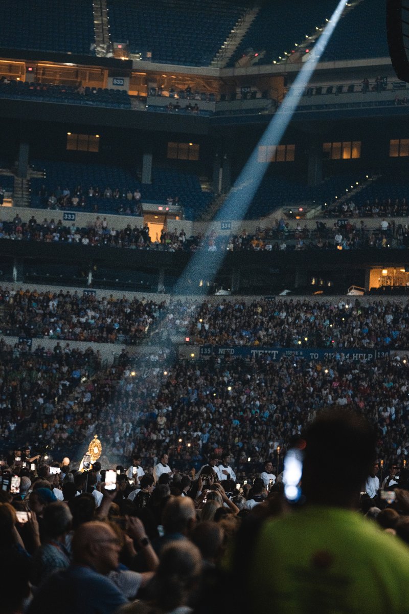 A spotlight shines on the monstrance displaying the Eucharist during the opening session of the National Eucharistic Congress on July 17. (Archdiocese of Los Angeles)