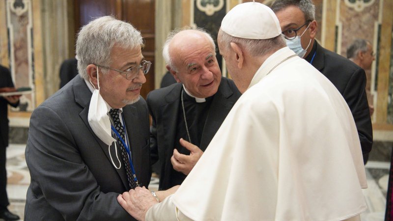 Pope Francis greets Dale Recinella, left, a lay Catholic minister in Florida who works with prisoners on death row, during a meeting with members of the Pontifical Academy for Life at the Vatican Sept. 27, 2021. (CNS/Vatican Media)