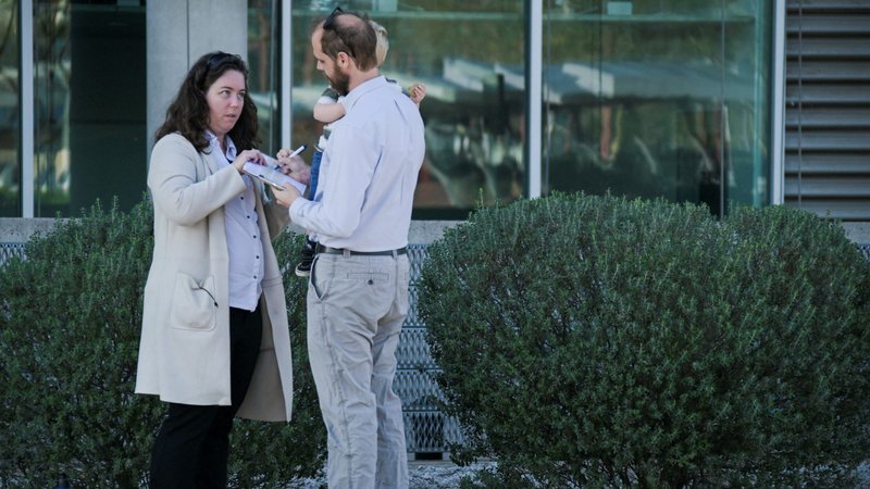 Jesse Goodsell, a volunteer with Healthcare Rising, talks with a signatory for the Arizona for Abortion Access ballot initiative at the Burton Barr Central Library as the Democratic and Republican parties hold primary elections in Phoenix March 19, 2024. (OSV News photo/Caitlin O’Hara, Reuters)