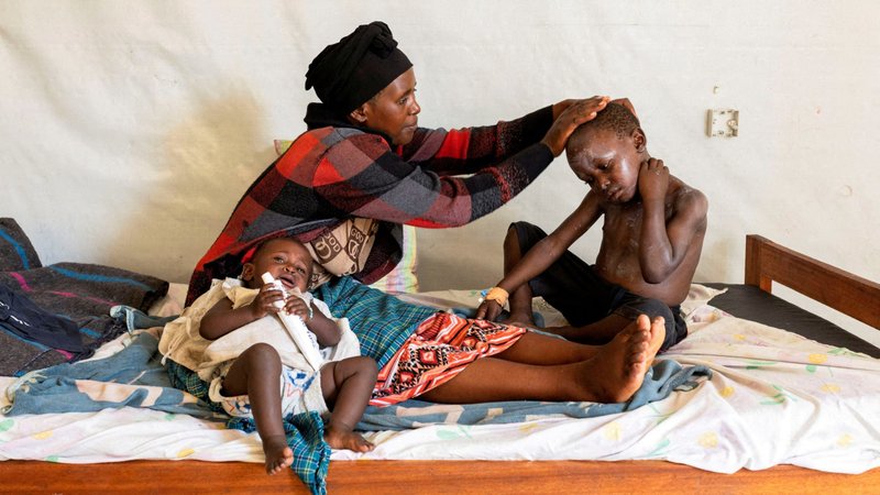 A mother applies medication on the skin of her child who is under treatment for mpox at a health center near Goma, Congo, Aug. 19, 2024. The infectious disease caused by the mpox virus results in a painful rash, enlarged lymph nodes and fever. (OSV News photo/Arlette Bashizi, Reuters)