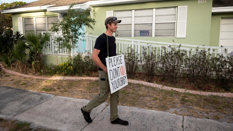 A pro-life activist demonstrates outside an abortion clinic in Fort Pierce, Fla., April 27, 2024. (OSV News photo/Marco Bello, Reuters)