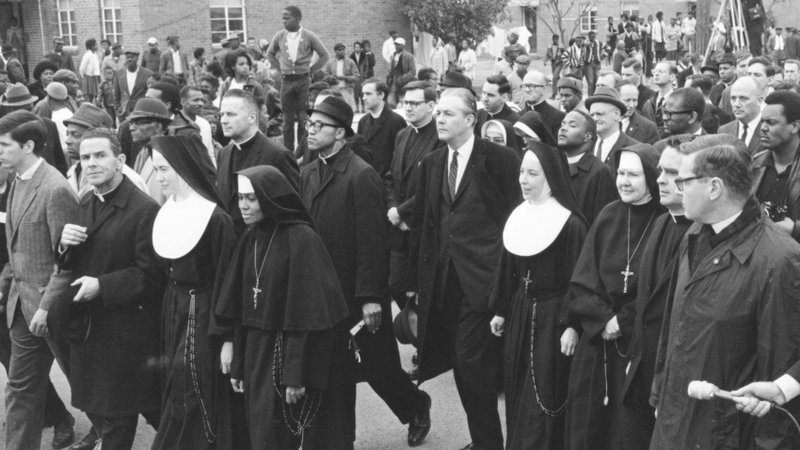 Sister Mary Antona Ebo, a Franciscan Sister of Mary, is pictured in the front row at the center with her superior, Sister Eugene Marie Smith, as they march in Selma, Ala., March 10, 1965, to support voting rights for Black Americans. A new book from Ignatius Press, "Catholic Heroes of Civil and Human Rights: 1800s to Present," tells the story of 16 different Catholics who advocated for human dignity and is set for release Sept. 13, 2024. (OSV News photo/courtesy St. Louis Review)