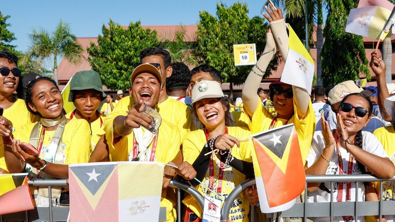 Young people wait for Pope Francis outside a convention center in Dili, Timor-Leste, Sept. 11, 2024. (CNS/Lola Gomez)