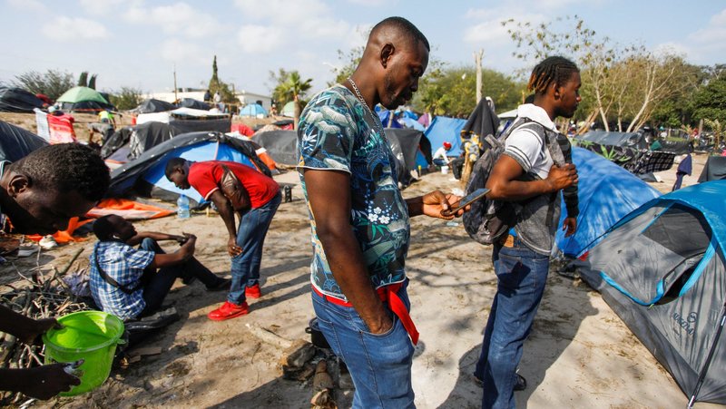 Haitian migrants who are seeking asylum in the United States wait at a makeshift encampment near the border between the U.S. and Mexico, in Matamoros, Mexico, Dec. 9, 2022. (OSV News photo/Daniel Becerril, Reuters)