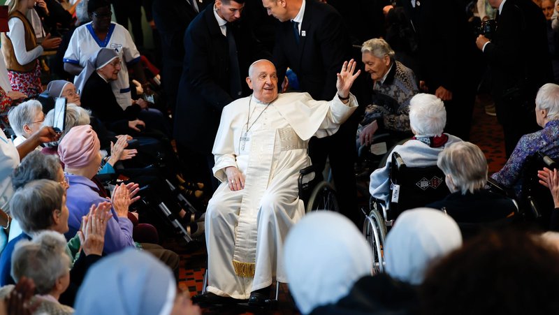 Pope Francis greets residents and staff at St. Joseph's Home in Brussels, a residence operated by the Little Sisters of the Poor for the elderly, Sept. 27, 2024. (CNS photo/Lola Gomez)