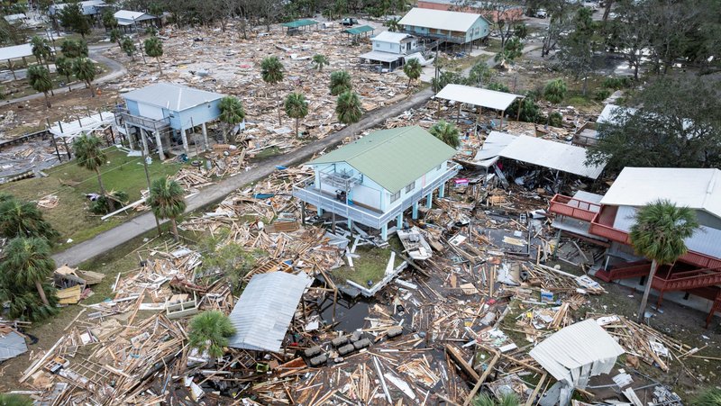 A drone view shows debris surrounding some homes left standing in Horseshoe Beach, Fla., Sept. 28, 2024, after Hurricane Helene swept through the area. Helene caused at least 52 deaths and billions of dollars of destruction across a wide swath of the southeastern U.S. as it raced through, and more than 3 million customers went into the weekend without any power and amid a continued threat of flooding. (OSV News photo/Marco Bello, Reuters)