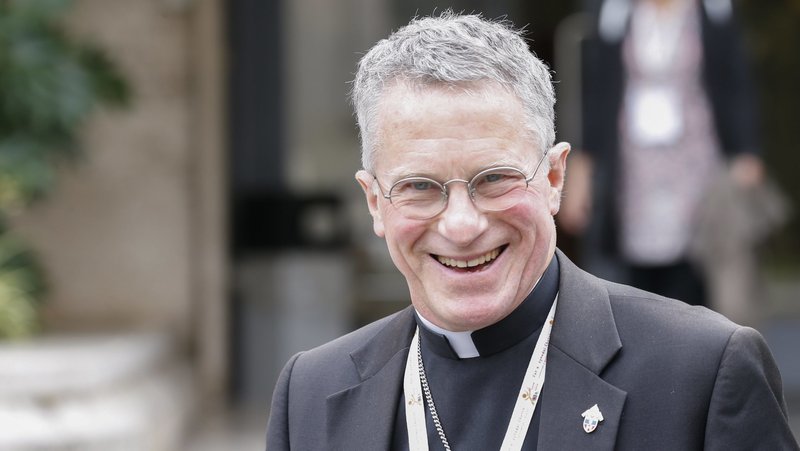 Archbishop Timothy P. Broglio of the U.S. Archdiocese for the Military Services, exits the Paul VI Audience Hall at the Vatican after the morning session of the Synod of Bishops on synodality Oct. 7, 2024. (CNS photo/Robert Duncan)