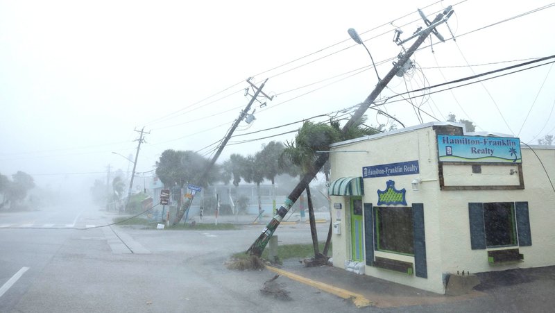 Broken utility poles downed by strong wind gusts are seen as Hurricane Milton approaches Fort Myers, Fla., Oct. 9, 2024. As Hurricane Milton bears down on Florida just days after Hurricane Helene, Catholic Charities USA announced Oct. 9 that it has launched a dedicated disaster relief donation campaign at ccusa.online/milton, with 100% of all funds raised to be allocated to local Catholic Charities agencies. (OSV News photo/Ricardo Arduengo, Reuters)