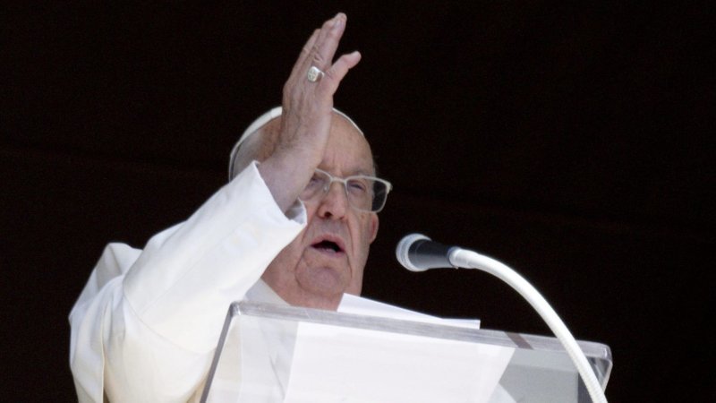 From the window of his studio in the Apostolic Palace, Pope Francis gives his blessing to people gathered in St. Peter's Square at the Vatican for the recitation of the Angelus prayer Oct. 13, 2024. (CNS photo/Vatican Media)
