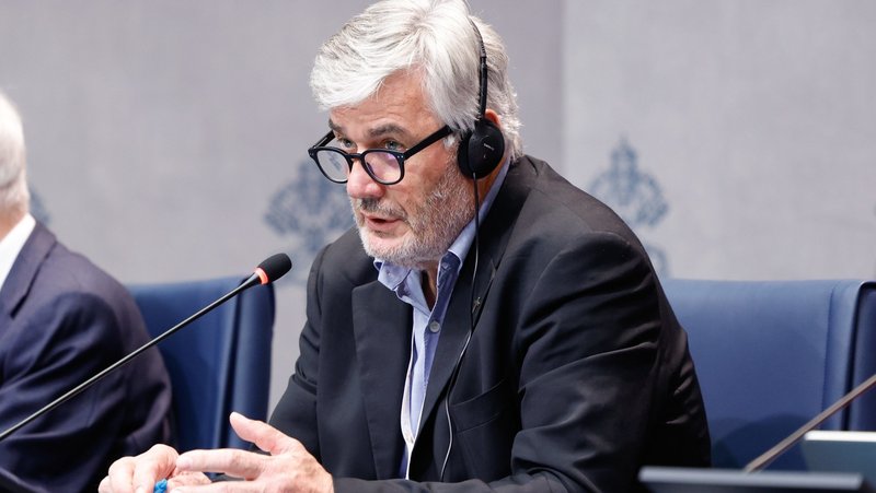 Father Dario Vitali, coordinator of theological experts assisting the synod and professor of dogmatic theology at Rome's Pontifical Gregorian University, speaks during a press briefing on the synod at the Vatican Oct. 16, 2024. (CNS photo/Lola Gomez)