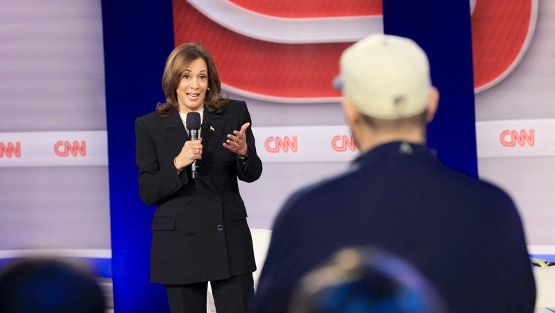 Vice President Kamala Harris, the Democratic presidential nominee, speaks to a man in the audience during a CNN town hall event in Aston, Pa., Oct. 23, 2024. After Harris said Oct. 22 she does not think "concessions" should be made on codifying abortion protections, some pro-life activists expressed concern that a potential Harris administration would not implement religious exemptions to abortion policy. (OSV News photo/Nicole Neri, Reuters) (OSV News photo/Kevin Mohatt, Reuters)