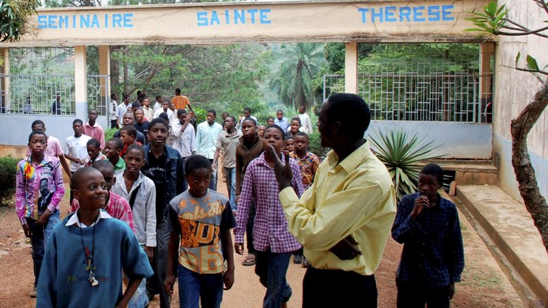 Students walk to church for midday prayers at the minor seminary of St. Therese of Mvolye in Yaounde, Cameroon in this 2009 file photo. (CNS photo/Saabi/ Galbe.Com)
