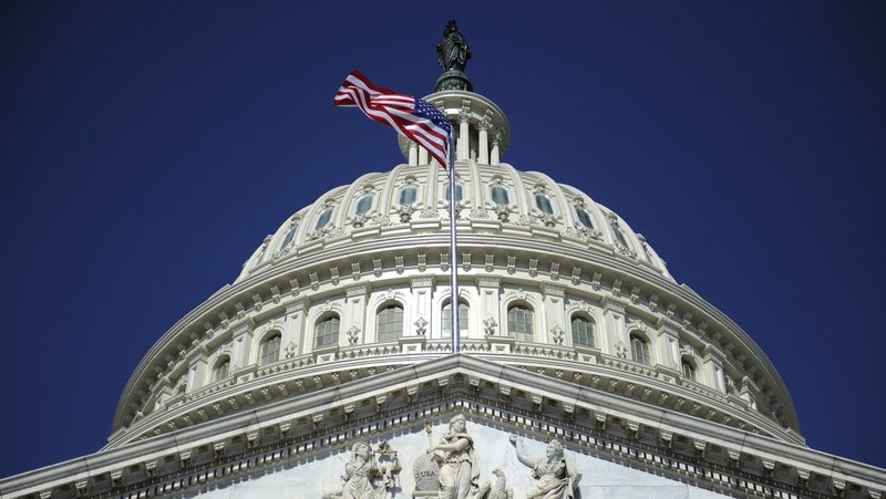 A file photo shows the American flag below the U.S. Capitol dome in Washington. (OSV News photo/Jonathan Ernst, Reuters)