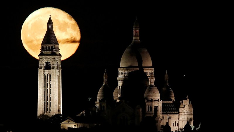 The moon rises over the 19th-century Sacré-Coeur Basilica on Montmartre in Paris Nov. 5, 2017. The Vienna-based Observatory on Intolerance and Discrimination against Christians in Europe revealed widespread intolerance and discrimination against Christians in Europe in its Nov. 15, 2024 report, published in cooperation with the Organization for Security and Co-operation in Europe, or OSCE, and its Office for Democratic Institutions and Human Rights. (OSV News photo/Christian Hartmann, Reuters)