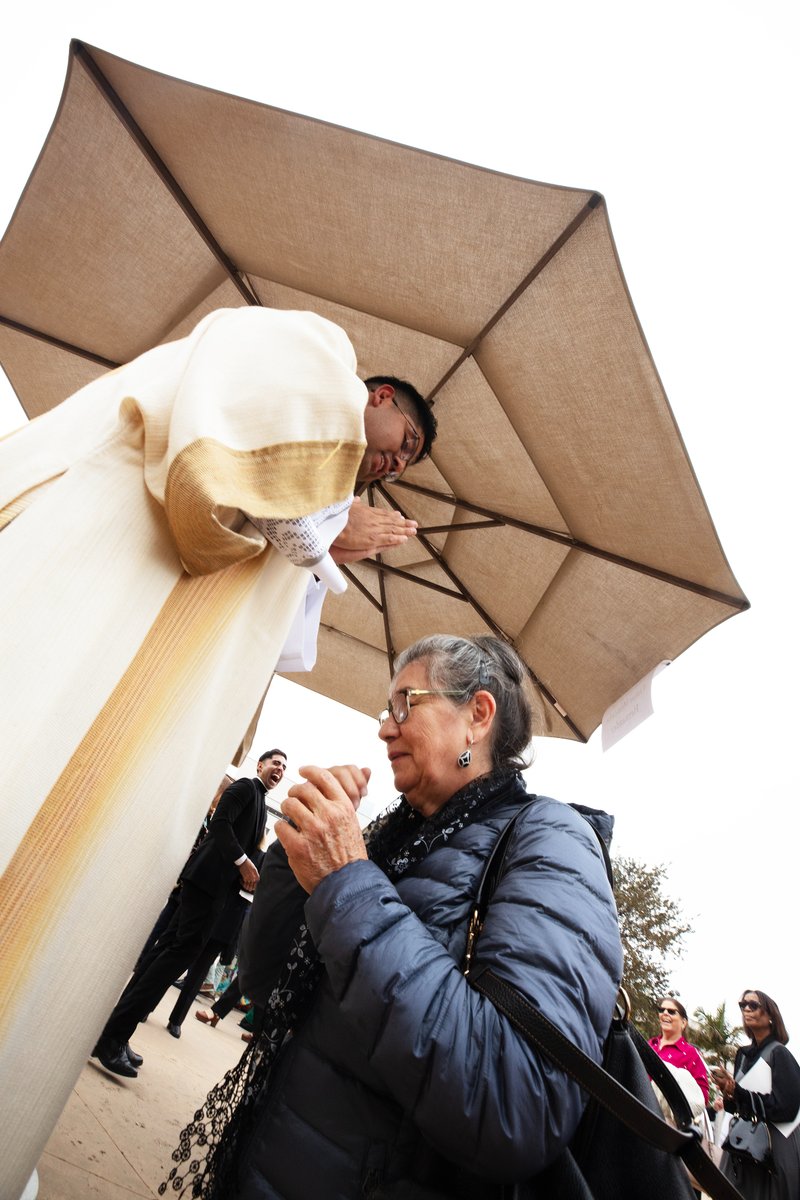 Deacon Jorge Moncada offers first blessings to supporters following his Ordination Mass at the Cathedral of Our Lady of the Angels on Nov. 23. (Victor Alemán)