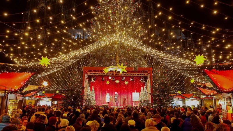 People attend the opening ceremony of a Christmas market in Cologne, Germany, Nov. 22, 2021. (CNS/Thilo Schmuelgen, Reuters)