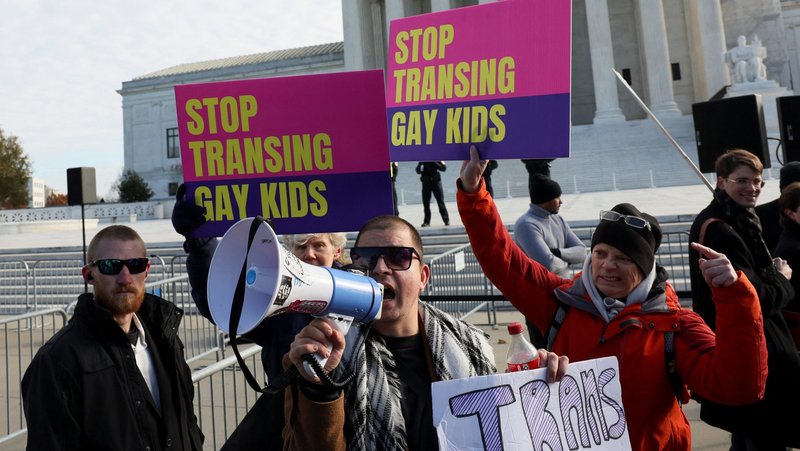Derek Torstenson uses a bullhorn outside the U.S. Supreme Court in Washington Dec. 4, 2024, as the justices hear arguments over an appeal by U.S. President Joe Biden's administration of a lower court's decision upholding a Republican-backed ban in Tennessee on gender-affirming medical care for transgender minors. (OSV News photo/Leah Millis, Reuters)
