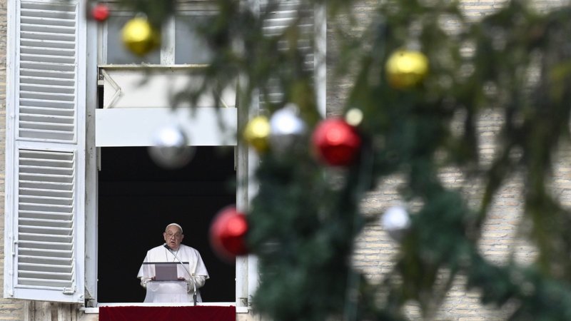 Pope Francis speaks to visitors joining him for the recitation of the Angelus prayer in St. Peter's Square at the Vatican Dec. 8, 2024. (CNS photo/Vatican Media)