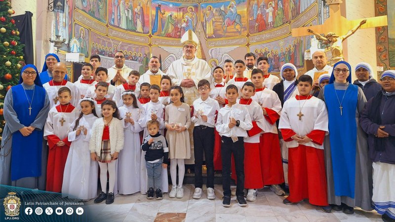 Cardinal Pierbattista Pizzaballa, Latin patriarch of Jerusalem, is seen with the Holy Family Parish church community in Gaza City Dec. 22, 2024. He made the pre-Christmas visit aiming to bring the joy of the season to the suffering Christian community in the 14th month of Israel-Hamas war. (OSV News photo/courtesy Latin Patriarchate of Jerusalem)