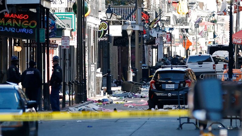 Debris is left along Bourbon Street after a pickup truck was driven into a large crowd in the French Quarter of New Orleans Jan. 1, 2025. A driver wrought carnage on New Orleans' famed French Quarter early on New Year's Day, ramming a pickup truck into a crowd and killing at least 15 people and injuring dozens before being shot to death by police, authorities said. (OSV News photo/Marc Weiszer, USA TODAY NETWORK via Reuters) Editors: NO RESALES. NO ARCHIVES. MANDATORY CREDIT