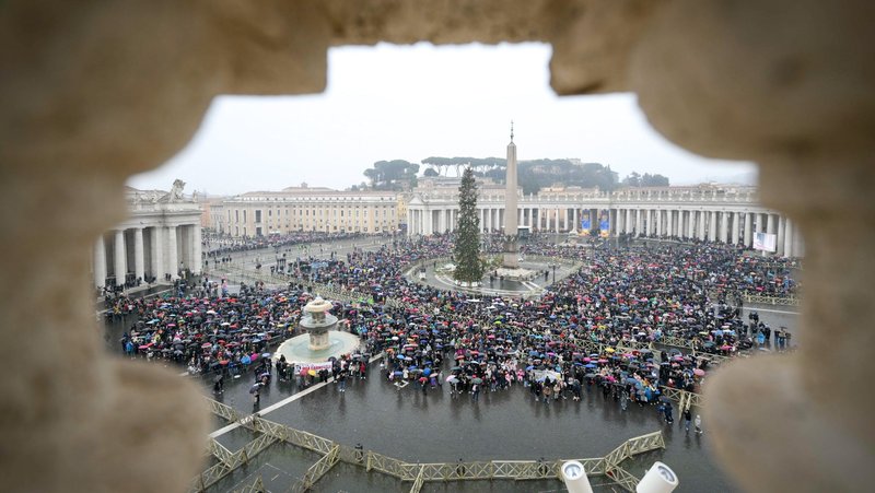 Visitors gather in St. Peter’s Square to join Pope Francis in praying the Angelus Jan. 5, 2025. (CNS photo/Vatican Media)