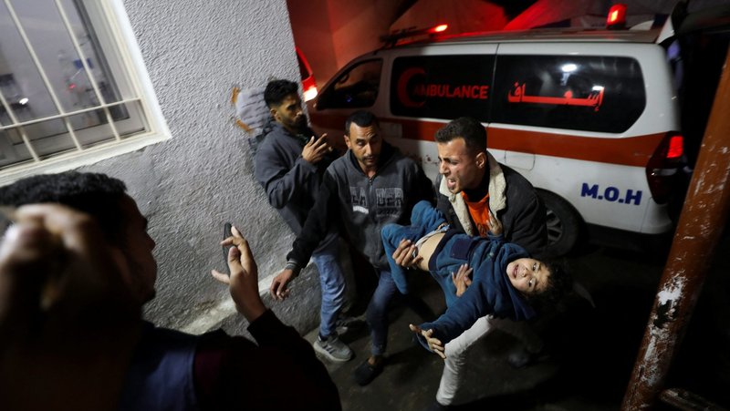 A wounded Palestinian child is rushed into a hospital in Gaza City Jan. 15, 2025, following an Israeli strike. Later the same day, a ceasefire deal was reached by Israel and Hamas, following a 15-month war that killed 46,600 Palestinians in the Gaza Strip, according to the Gaza Health Ministry. The war was launched after the brutal Oct. 7, 2023, Hamas attack on Israeli communities that killed 1,200 people. (OSV News/Dawoud Abu Alkas Reuters)