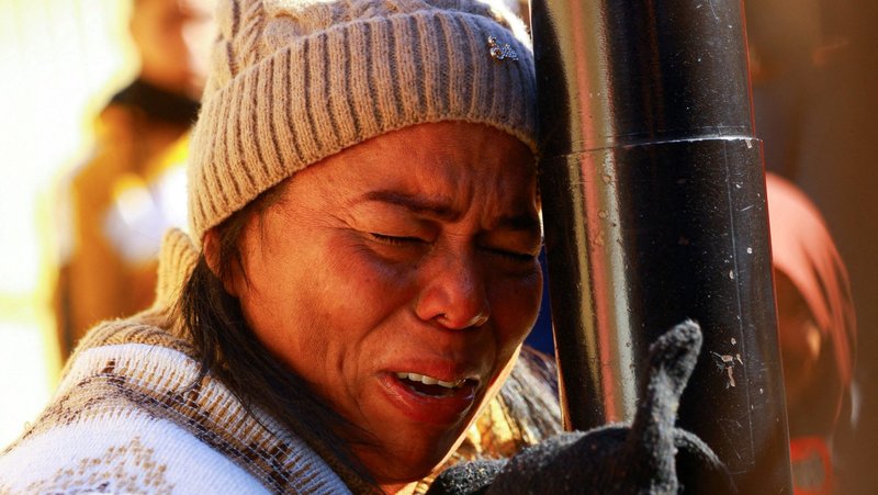 Margelis Tinoco, a migrant from Colombia, reacts after receiving news that her U.S. Customs and Border Protection's smartphone application CBP One was cancelled at the Paso del Norte International border bridge in Ciudad Juarez, Mexico, Jan.20, 2025, on Inauguration Day, when Donald Trump was sworn in for his second presidential term. (OSV News photo/Jose Luis Gonzalez, Reuters)