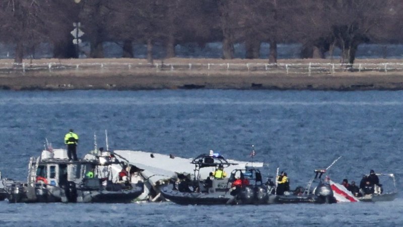 Emergency workers recover debris from the Potomac River in Washington Jan. 30, 2025, after American Eagle flight 5342 collided in midair with a Black Hawk Army helicopter late Jan. 29 while on approach for landing at Ronald Reagan Washington National Airport. (OSV News/Carlos Barria, Reuters)