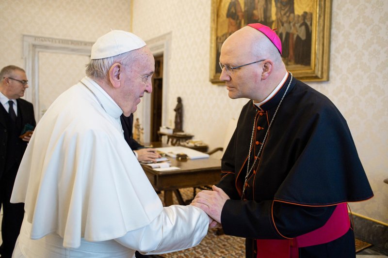 Pope Francis greets Bishop Edward J. Weisenburger of Tucson, Ariz., during a meeting with U.S. bishops at the Vatican Feb. 13, 2020. The bishops were making their "ad limina" visits to the Vatican to report on the status of their dioceses to the pope and Vatican officials. (CNS photo/Vatican Media)