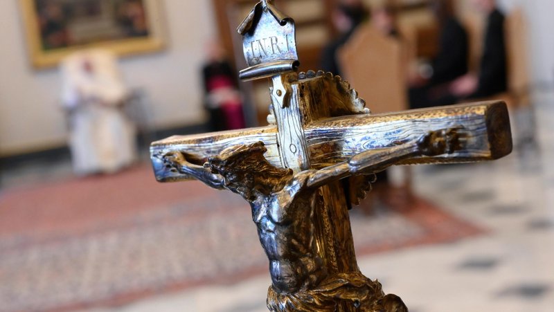 A crucifix is seen as Pope Francis leads his general audience from his library in the Apostolic Palace at the Vatican May 20, 2020. (CNS photo/Vatican Media)