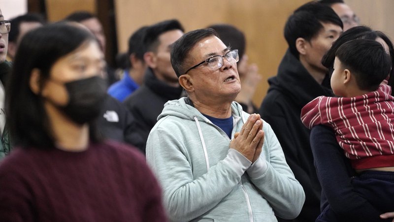 A man prays during a Mandarin-language Mass marking the Lunar New Year at St. John Vianney Church in Flushing, N.Y., Feb. 2, 2025. (OSV News/Gregory A. Shemitz)