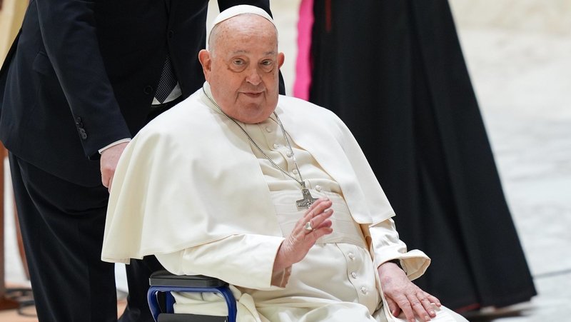 Pope Francis greets visitors at the conclusion of his general audience in the Paul VI Audience Hall at the Vatican Feb. 12, 2025. (CNS photo/Lola Gomez)