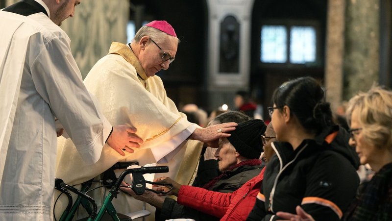 Bishop Paul Mason of the Military Ordinariate of Great Britain, who heads the health and social care division of the Bishops' Conference of England and Wales, blesses a woman during Mass at London's Westminster Cathedral Feb. 8, 2025. The Mass was celebrated in honor of the feast of Our Lady of Lourdes and World Day of the Sick on Feb. 11. (OSV News photo/Marcin Mazur, Bishops' Conference of England and Wales)