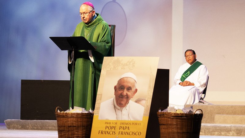 A portrait of Pope Francis is seen as Archbishop José H. Gomez delivers the homily at the congress closing Mass. (Victor Alemán)