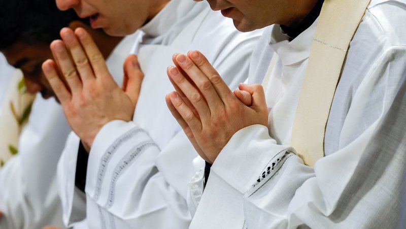 Priests join Pope Francis for the celebration of the chrism Mass in St. Peter's Basilica at the Vatican March 28, 2024. (CNS photo/Lola Gomez)