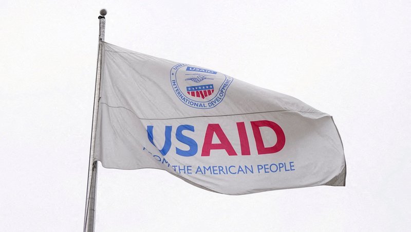 A flag flies outside the U.S. Agency for International Development building in Washington Feb. 3, 2025, as the agency sits closed to employees after a memo was issued advising USAID personnel to work remotely. The Supreme Court on March 5 rejected the Trump administration's request to freeze nearly $2 billion in foreign aid payments, directing the White House to abide by a lower court order. Catholic nongovernmental organizations are among those impacted by the freeze. (OSV News photo/Kent Nishimura, Reuters)