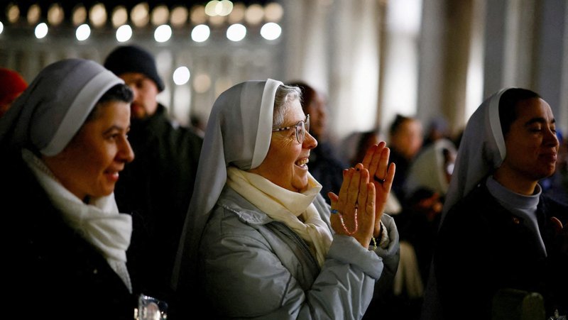 A nun applauds as she listens to an audio message by Pope Francis at the Vatican March 6, 2025. A weak and breathless Pope Francis thanked people for their prayers for his recovery in a remarkable audio message broadcast March 6, the first public message from the 88-year-old pope since he was hospitalized Feb. 14 for bronchitis and labored breathing. He was later diagnosed with double pneumonia. (OSV News photo/Yara Nardi, Reuters)