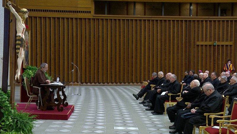 Capuchin Father Roberto Pasolini, preacher of the papal household, shares his meditation with members of the Roman Curia during their Lenten retreat in the Paul VI Audience Hall at the Vatican March 11, 2025. (CNS screengrab/Vatican Media)