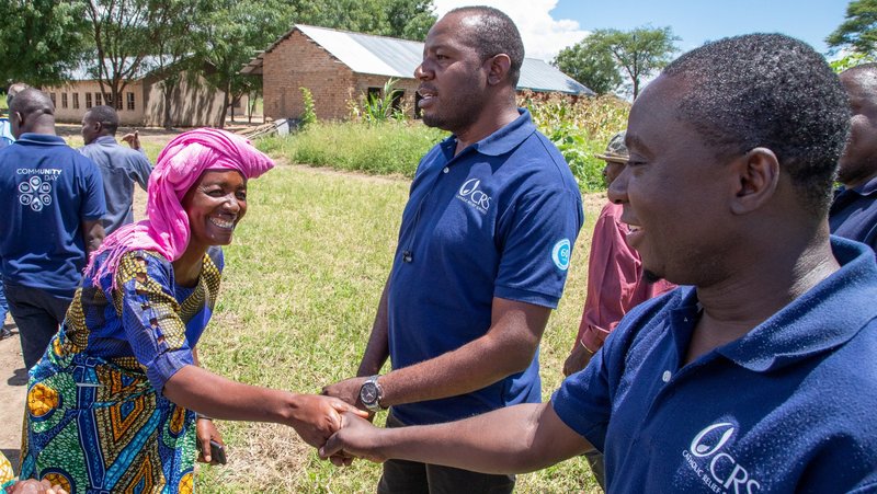 A village woman greets a Catholic Relief Services worker in Ipwizi, Tanzania, as CRS celebrates its 60th year of presence in Tanzania in March 2023. (OSV News/Carlos Barrio, Catholic Relief Services)