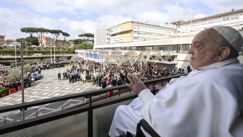 Pope Francis greets well-wishers at Rome's Gemelli hospital before returning to the Vatican March 23, 2025, after 38 days of treatment at the hospital. (CNS photo/Vatican Media)