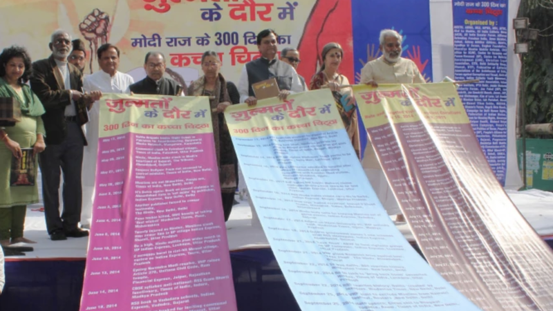 Activists display a long list of atrocities against minorities on the first 300 days of the Narendra Modi government on March 19, 2015. (Anto Akkara via CNA)