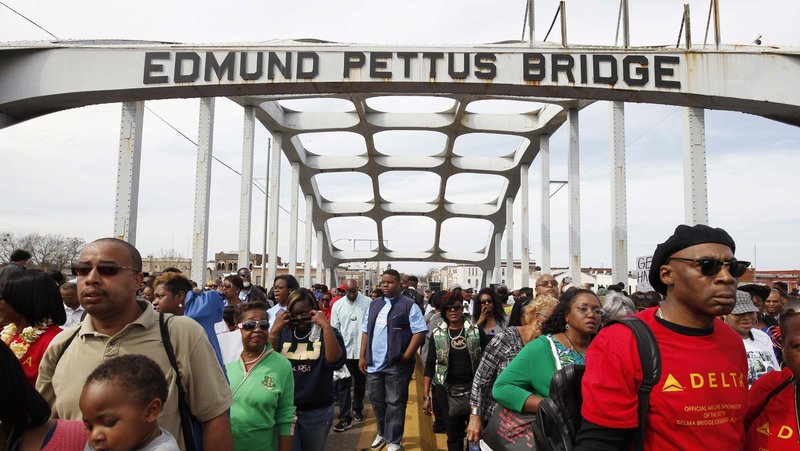 Thousands of people march across the Edmund Pettus Bridge in Selma, Alabama, during a 2015 commemoration of the 50th anniversary of the 1965 civil rights march from Selma to Montgomery, the state capital. (CNS/Tami Chappell, Reuters)