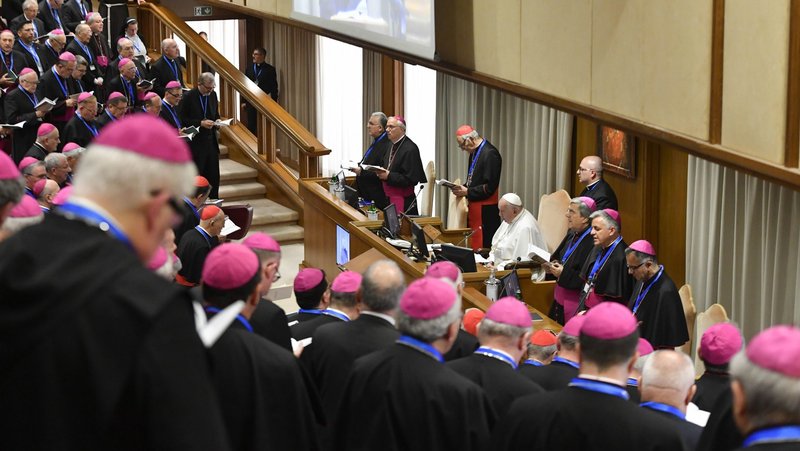 Pope Francis prays with Italian bishops in the Vatican synod hall during the general assembly of the Italian bishops' conference in this file photo from May 20, 2024. (CNS photo/Vatican Media)