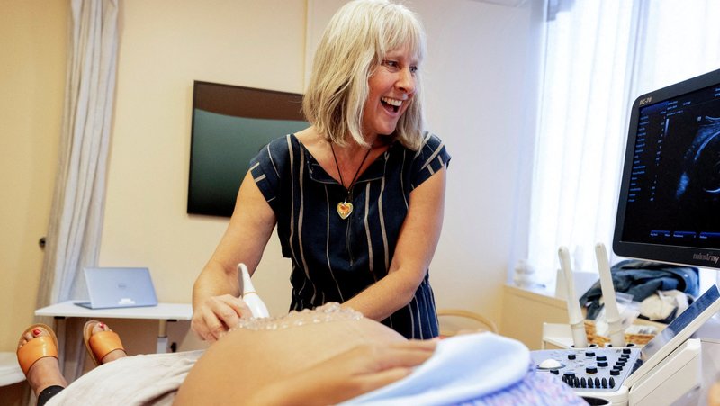 A certified nurse midwife smiles as she performs an ultrasound during a patient's 36-week checkup at a birthing center in Berkeley, Calif., Aug. 1, 2024. Idaho Republican Gov. Brad Little signed Senate Bill 1046 into law March 27, 2025, following its approval by the Idaho Senate in a 27-8 vote on Feb. 27 and by the Idaho House of Representatives in a 63-6 vote on March 18. (OSV News photo/Brittany Hosea-Small, Reuters)