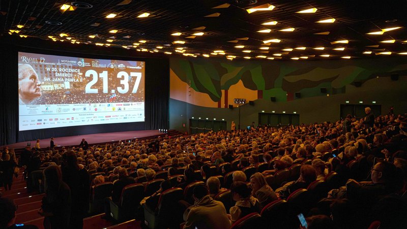 A full auditorium is seen April 1, 2025, during the premiere screening of the documentary "21:37" in Kijów cinema in Kraków, Poland. On April 2, 2005, the world mourned the passing of St. John Paul II. At 9:37 p.m., his earthly journey ended, but in his homeland of Poland, a powerful spiritual community began to form. The documentary recalls that special time and shows how it shaped people that mourned their beloved pontiff.(OSV News photo/courtesy Raphael film)